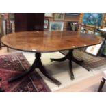 A Georgian style mahogany double pedestal dining table