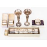 Napkin rings, eleven various, together with a pair of weighted posy vase, Sheffield 1914-15, 7.