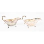 A pair of late Victorian plain silver sauceboats, gadroon rim,