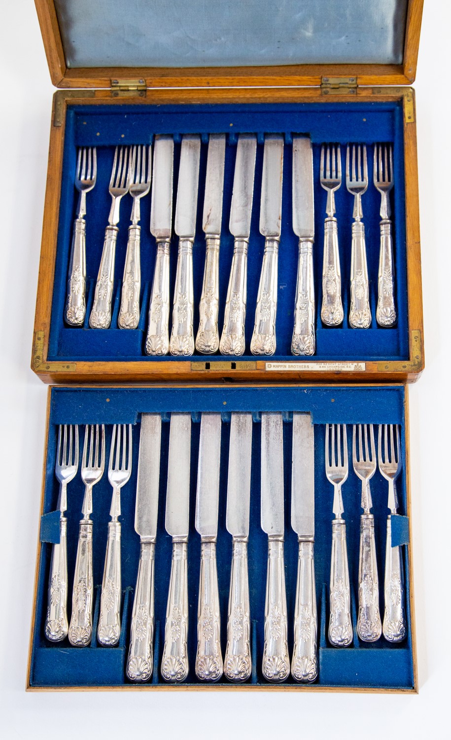 A Mappin Bros canteen of knives and forks for twelve,