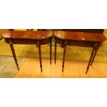 A pair of walnut veneered side tables,