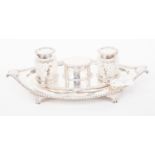 A late Victorian navette shaped double inkstand,