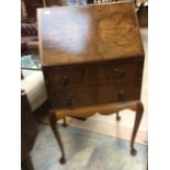 A Georgian style mahogany bureau, the fall front enclosing a fitted interior, two drawers below,