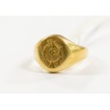 An 18ct gold signet ring, initialed to the top, size N,