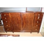 An early 19th Century mahogany dwarf linen press,