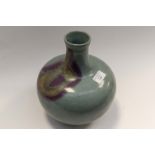 An Oriental ovoid vase of recent manufacture,