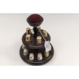 A collection of Royal Crown Derby thimbles,
