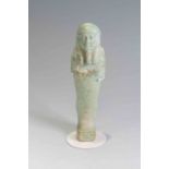 Egyptian Faience Shabti Late Dynastic Period, C. 525 - 32 BC. A nicely blue glazed figure with