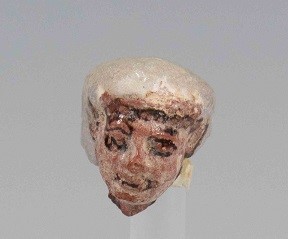 Egyptian Polychrome shabti head. Late 2nd Millennium B.C A head of a painted polychrome shabti