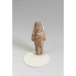 Egyptian Faience Shabti Third Intermediate Period, Circa 900 BC. The figure is depicted in mummiform