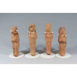A group of four Egyptian pottery shabtis