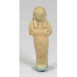 Egyptian Faience Shabti Amulet Ptolemaic Period, C. 300 BC. The figure is depicted in mummiform,