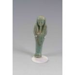 Egyptian Faience Shabti Late Period, c. 525 B.C. The figure is depicted in mummiform position