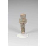 Egyptian Faience Shabti Third Intermediate Period, Circa 900 BC. The figure is depicted in mummiform