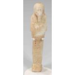 Egyptian Faience Shabti Late Dynastic Period, C. 525 B.C. The figure is depicted in mummiform,