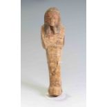 Egyptian Wood Shabti New Kingdom, Ramesside Period, 19th Dynasty, 1295 B.C The figure is depicted in