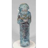 Egyptian Faience Shabti Third Intermediate Period, Circa 900 BC. The figure is depicted in bright