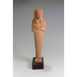 Egyptian Pottery Shabti New Kingdom, C. 1550 – 1070 B.C.  The figure is depicted in mummiform,