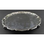 A silver circular card tray, by C J Vander Ltd, assayed Sheffield 1989. having stepped border,