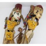 **REOFFER IN APR LONDON 40/60**Two early 20th century Indonesian painted wooden puppets, each with