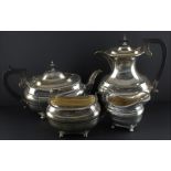 A silver four piece tea set, by Walker & Hall, assayed Sheffield 1945, comprising lidded tea and