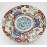 **REOFFER IN APR LONDON60/80**A Japanese Meiji Period (1868-1912) Imari charger, centred in under