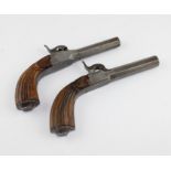 A pair of 19th century percussion cap folding trigger pocket pistols, with 3 inch octagonal