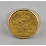 A 1910 Edward VII gold sovereign ring, London mint sovereign, yellow metal ring, (yellow metal