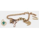 A 9ct. gold curb link charm bracelet, each link impressed "375", suspending a gold maple leaf charm,