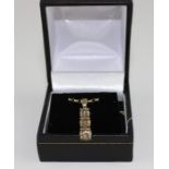 An 18ct. gold and diamond pendant, (diamond weight approx. 1.4 carats)