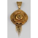 A Victorian 15ct. yellow gold target pendant with fringe, of circular form, having raised centre set