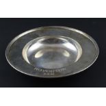 A silver circular dish, by Theo Fennell, assayed London 1993, the wide rim with stepped edge