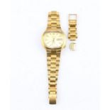 An 18ct. gold Bulova Accutron bracelet watch, quartz movement, ovoid brushed gilt dial with gold