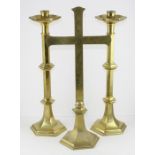 A pair of large brass altar candlesticks, 46 cm high together with a matching crucifix (3)