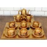 **REOFFER IN APR LONDON 150/250**A modern Chinese lacquered 17 piece tea set, comprising tray, tea
