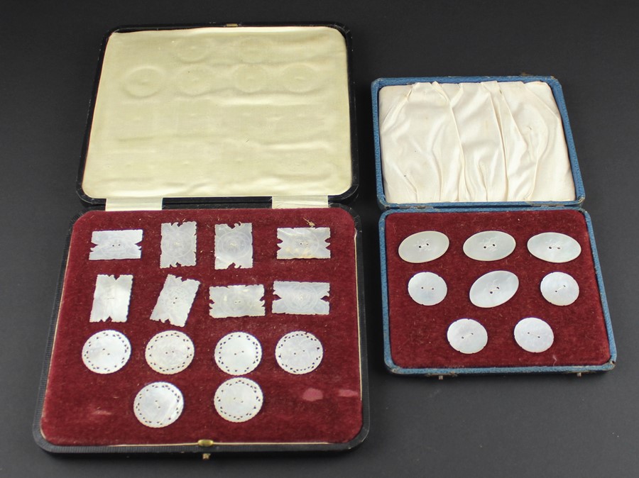 WITHDRAWN-A cased Chinese morther of pearl button set and smaller cased set