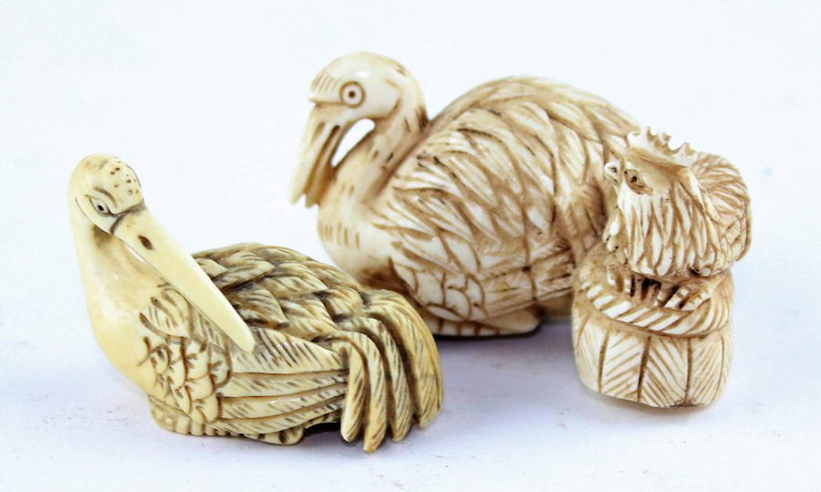 Japanese Meiji Period (1868-1912) ivory netsuke, realistically carved as a crane alongside a hen