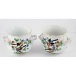 A pair of early 20th century Dresden porcelain twin handled bowls in the Meissen style, decorated
