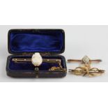 A 14ct. yellow gold cameo bar brooch, having oval shell cameo carved as the bust of a classical