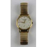 An 18ct. gold IWC  gentleman's bracelet watch, c.1956, manual movement, having gold Arabic numeral