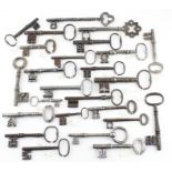 A collection of 25 antique keys to include a 15th/16th century key, later 18th/19th century