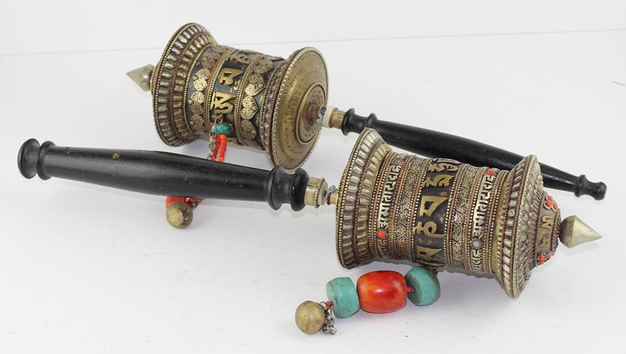 **REOFFER IN APR LONDON 30/50**Two Tibetan brass and silvered prayer wheels, with inscription