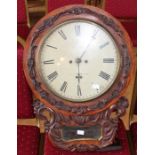 A Victorian carved oak wall clock, with single fusee and single train movement, the dial inscribed