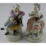 A near matched pair of late 19th century Meissen porcelain figures, one modelled as a young girl