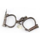 A set of Victorian 'Hiatt Best' iron Handcuffs
