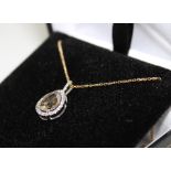 **VENDOR COLLECTED THE LOT ON 14/02/19**An 18ct. white gold and fancy cinnamon diamond pendant,