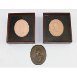 William & Mary; a pair of terracotta portrait medallions, raised border, both bust right, he