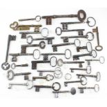 A collection of 30 antique keys to include a 16th century padlock key, various 18th century safe