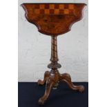 A late 19th century walnut games table, with folding drop flap top on a pedestal base, fully open 61