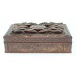 **REOFFER IN APR LONDON 60/80**Military interest, An Indian carved hardwood table top box,